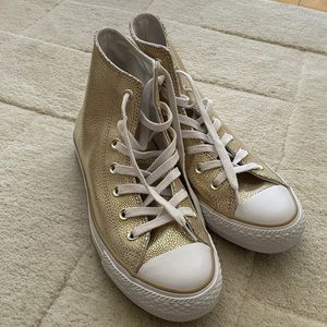 Gold high top Converse